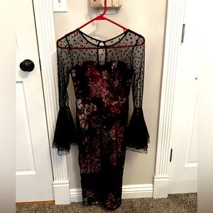 Super cute lace dress. Could be used to wear to wedding or homecoming.